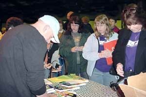 Joel signing books